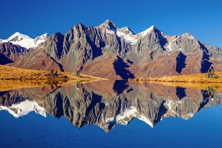 landscape of brown mountain and lake