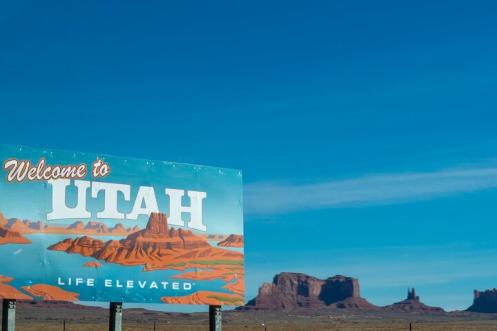 welcome to utah poster under blue daytime sky