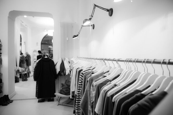 grayscale photography of clothes lot