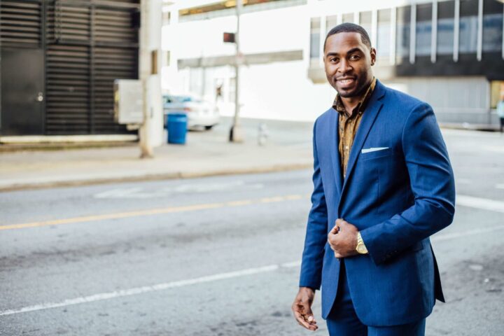 man wearing blue blazer